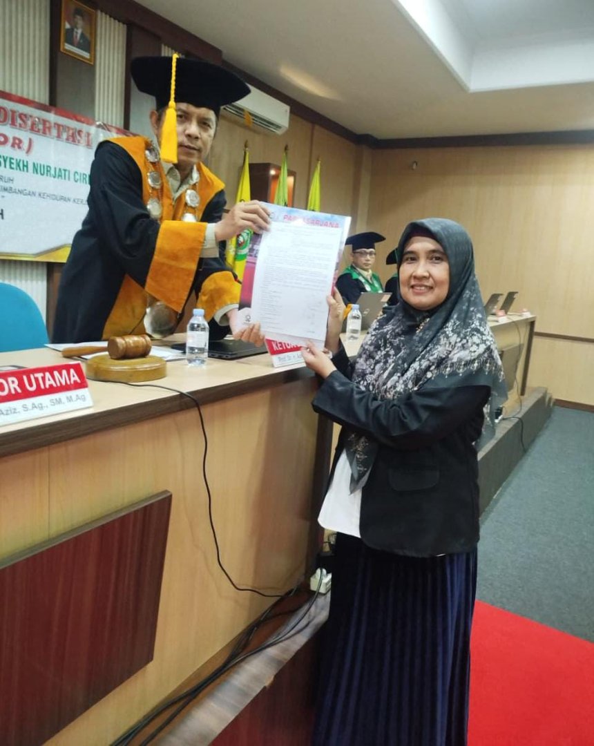 NINING WAHYUNINGSIH  PERTAHANKAN DISERTASI DOKTOR, KAJIAN PERAN KEADILAN DISTRIBUTIF DAN SPIRITUALITAS ISLAM DALAM MENINGKATKAN KINERJA PEGAWAI BANK SYARIAH